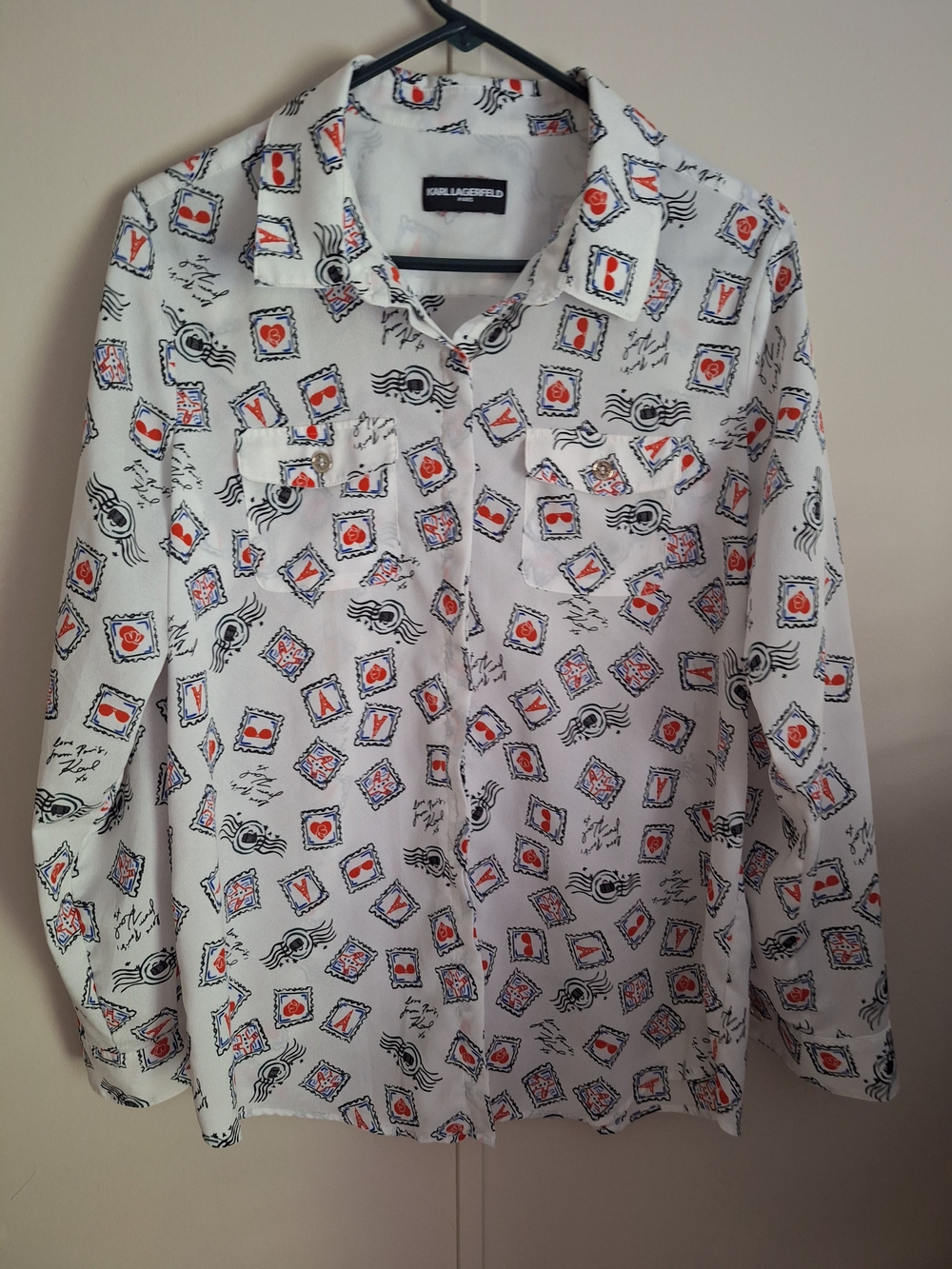 Karl Lagerfeld Paris "Love From Paris" postage stamp print button-up blouse.
